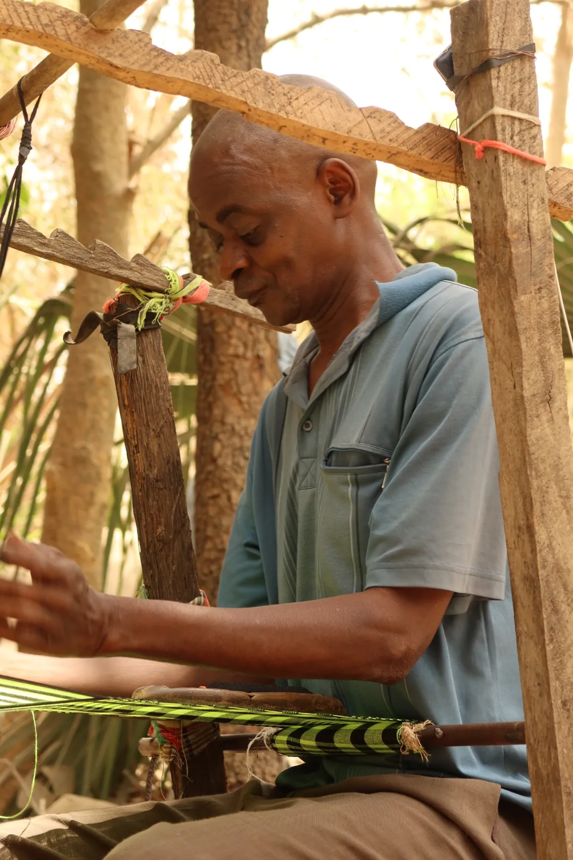 Craftsperson working on a traditional hand loom